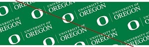 UO Signature example tiled across the page making a pattern with a red line across it