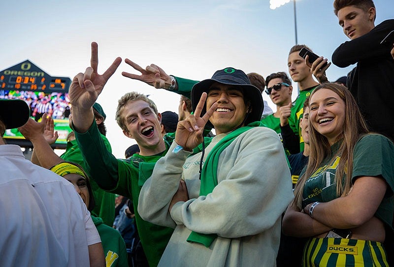 UO students looking happy at an athletic event