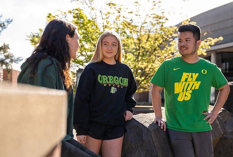 UO students having a conversation outside