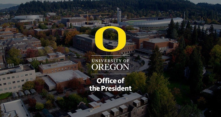 Example of UO stacked logo on aerial Eugene campus image
