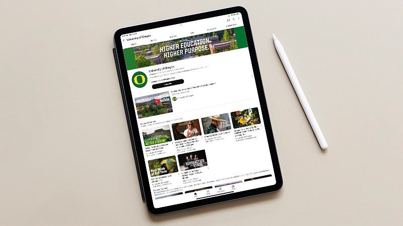 the UO YouTube channel on a tablet screen