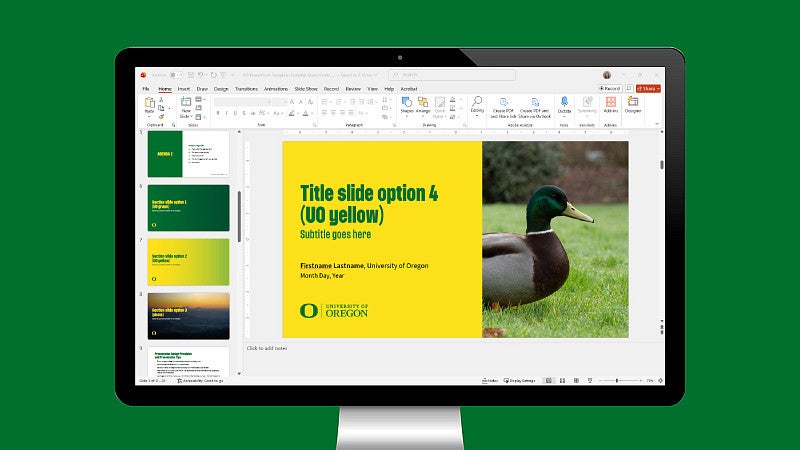 monitor showing the UO Powerpoint design template 