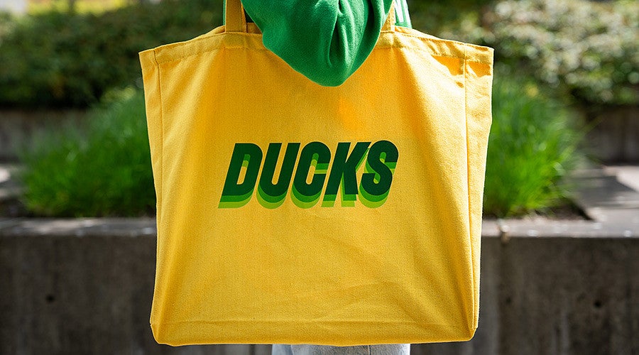 yellow tote bag with the word "Ducks"