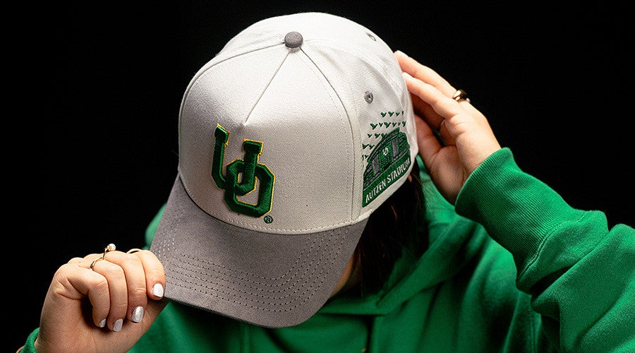 White baseball cap with UO embroidery
