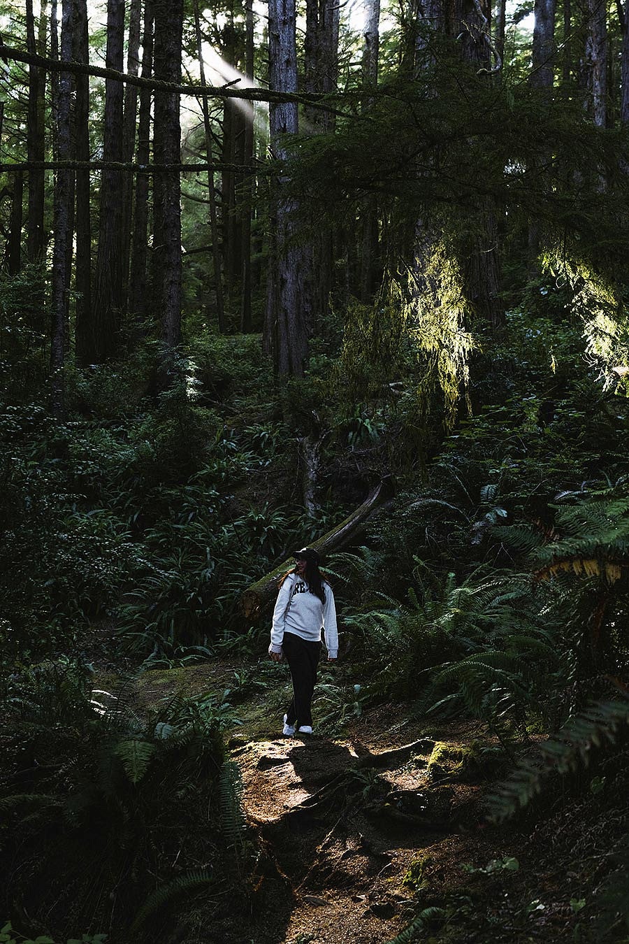 Woman walking in the woods