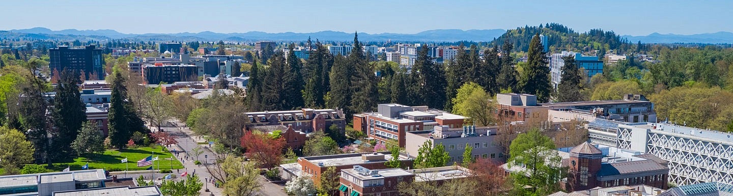 an aerial shot of the UO campus and city of Eugene on a sunny day